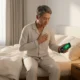 3D photorealistic scene showing emergency heart attack response with person calling 911 and aspirin tablet on nightstand beside them